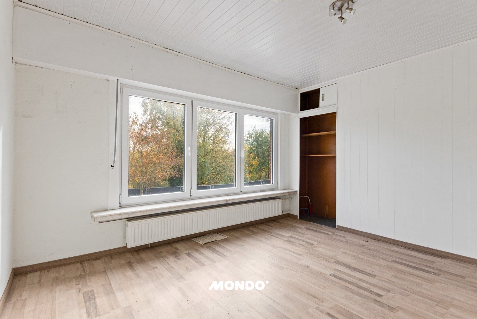 Rustig gelegen woning met 3 slaapkamers en veel potentieel nabij het centrum! foto 12