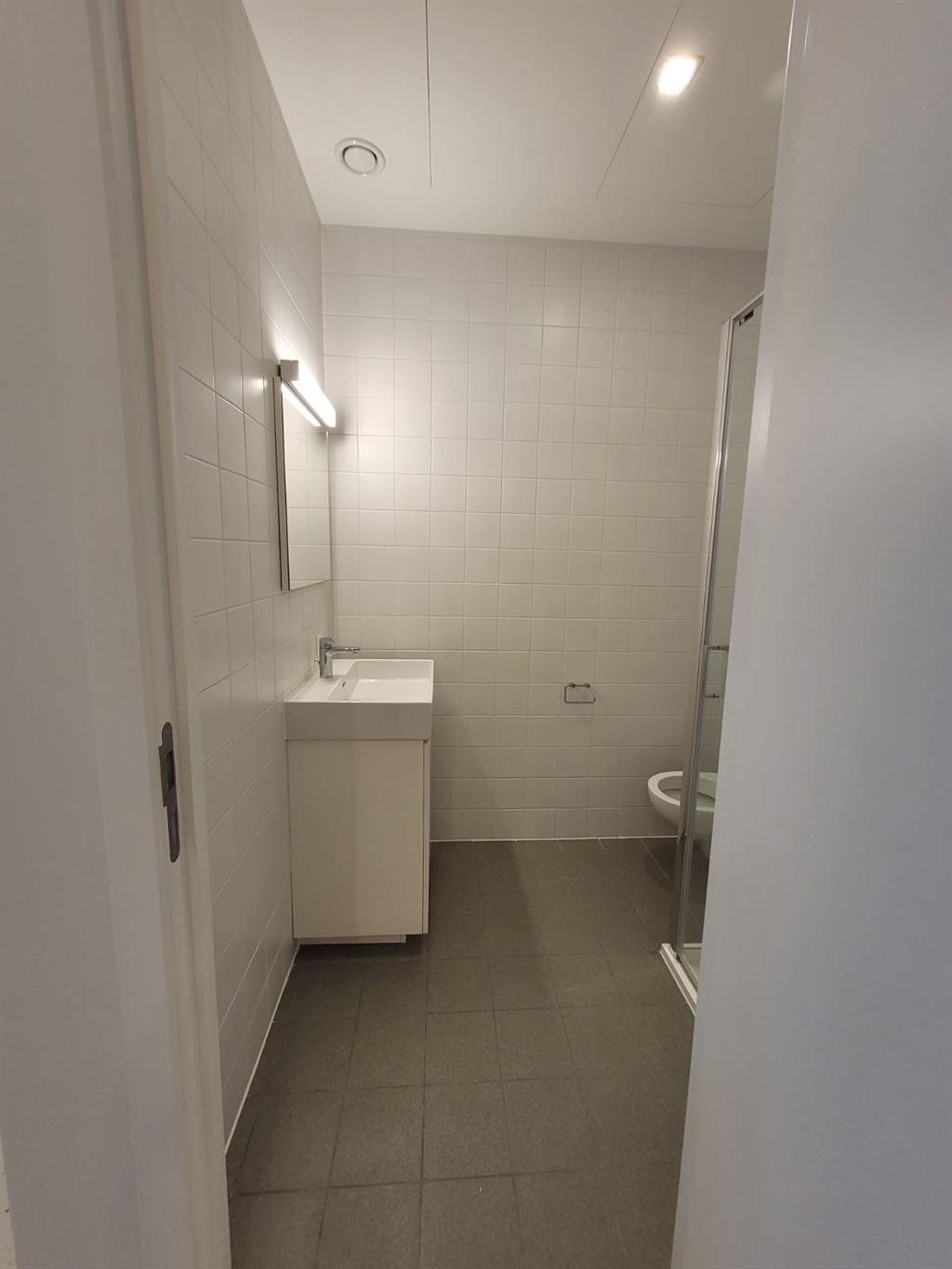 Prachtige hoogwaardige nieuwbouw studentenkamer in hartje Leuven.  foto 10
