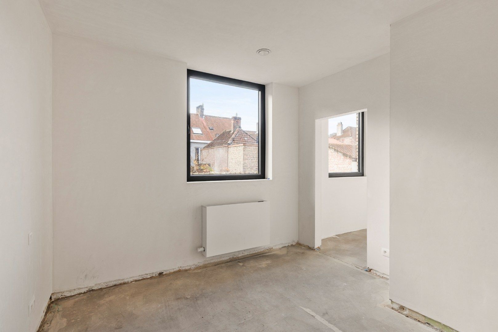 af te werken kangoeroewoning met binnentuin binnen de Brugse Reien foto 25