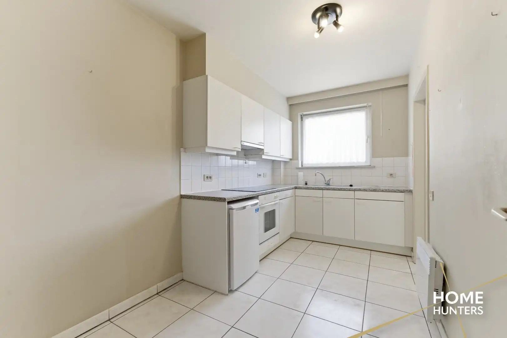 Instapklaar gelijkvloers appartement met 2 slaapkamers en ruime tuin foto 10