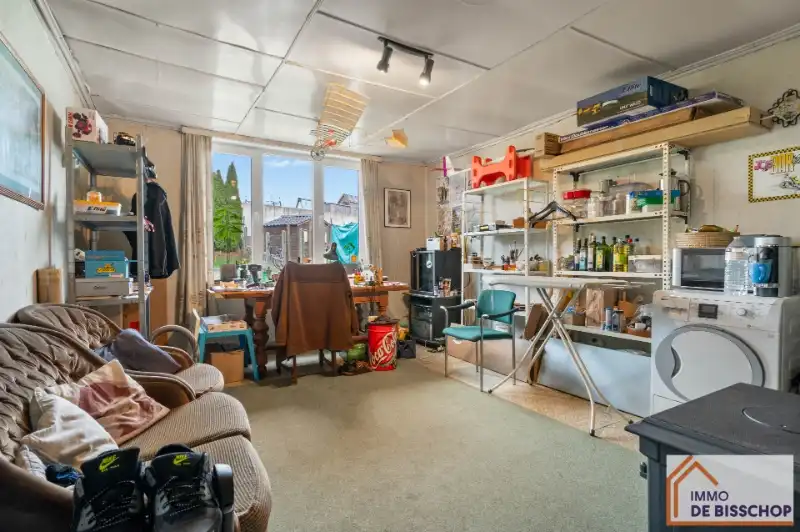 Te renoveren half open bebouwing met 3 slaapkamers, tuin en garage. foto 6