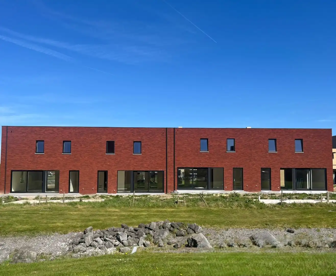 Nieuwbouwwoningen in De Vloei te Ieper foto {{pictureIndex}}