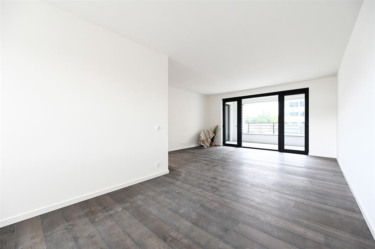 Ruim 1 slaapkamerappartement met groot terras in project Zilverkwartier te Berchem foto 9