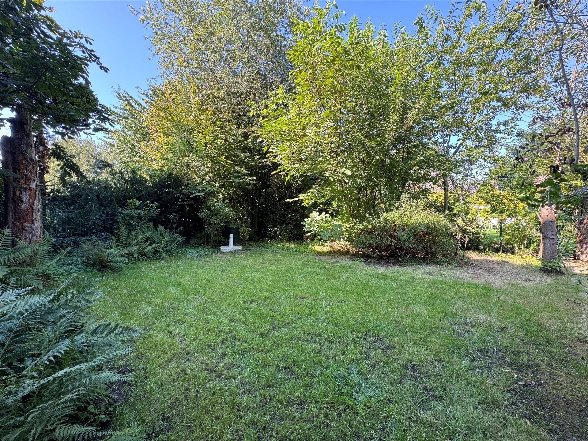 Gerenoveerd ruim appartement met tuin en garage gelegen in de wijk “Het Westveld”. foto 27