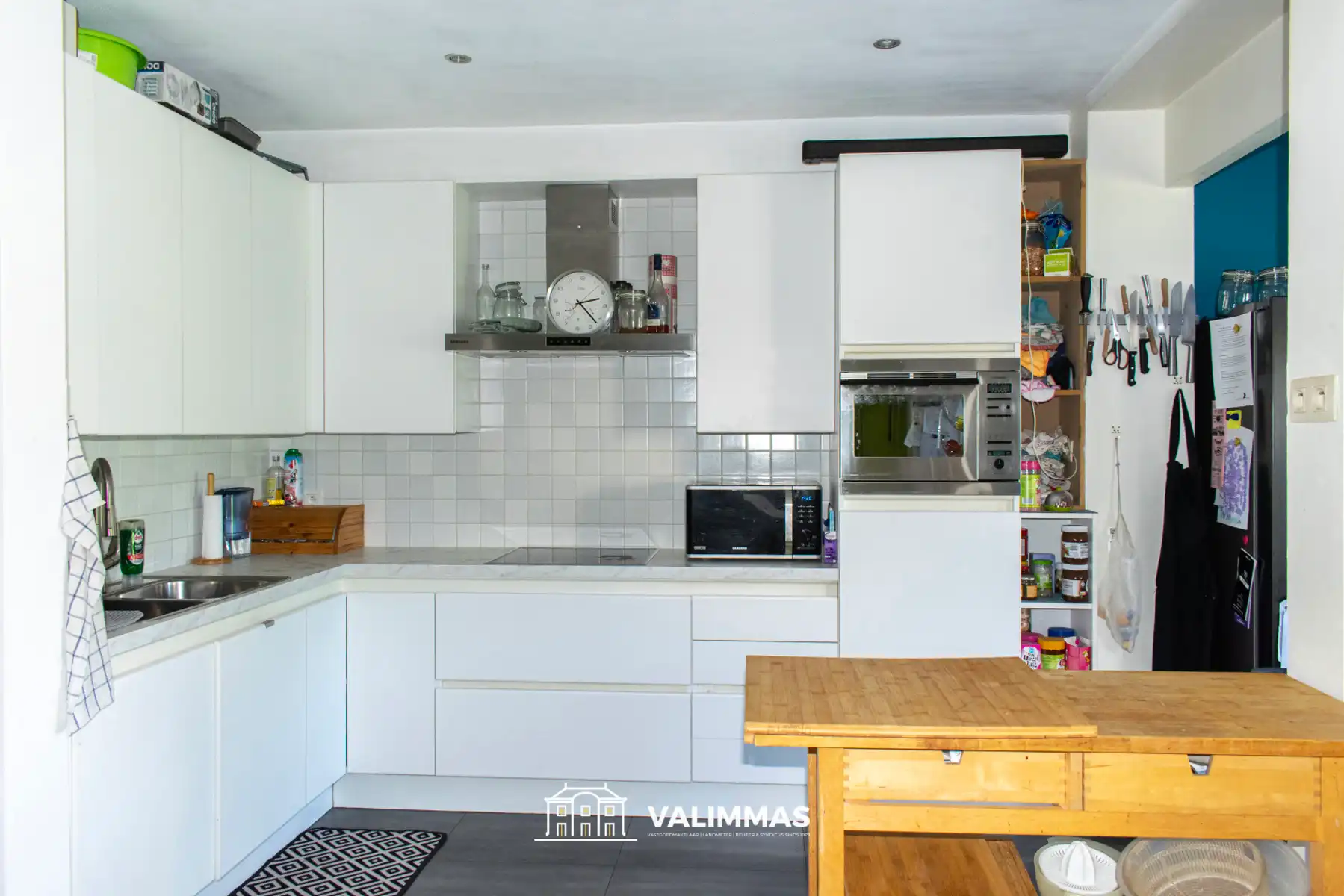 Welgelegen en instapklare woning met gezellige tuin & garage foto 7
