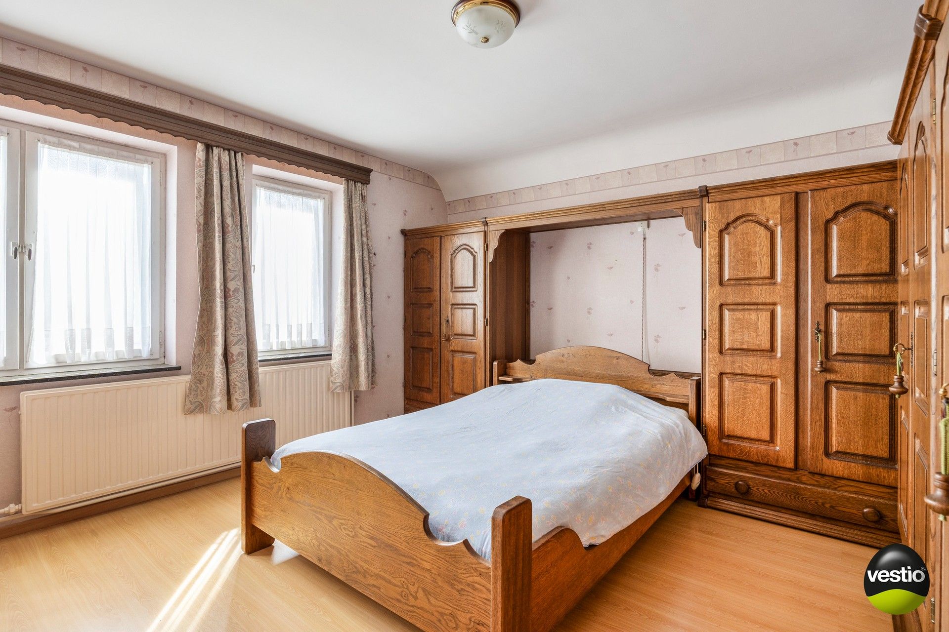 Charmante gezinswoning met drie slaapkamers op rustige, centrale ligging te Genk foto 12