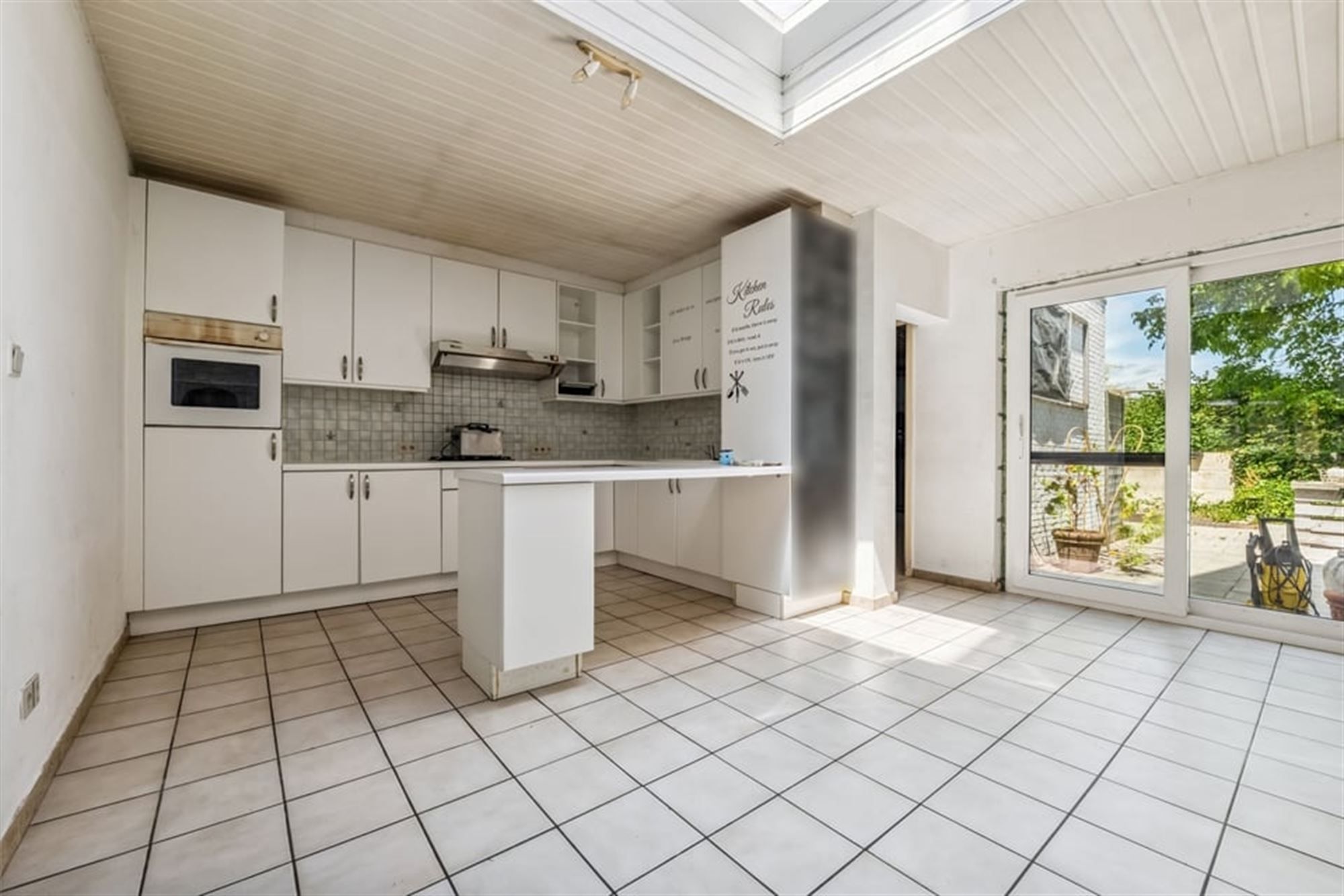 KNUSSE GEZINSWONING MET GEZELLIGE STADSTUIN IN HASSELT foto 10
