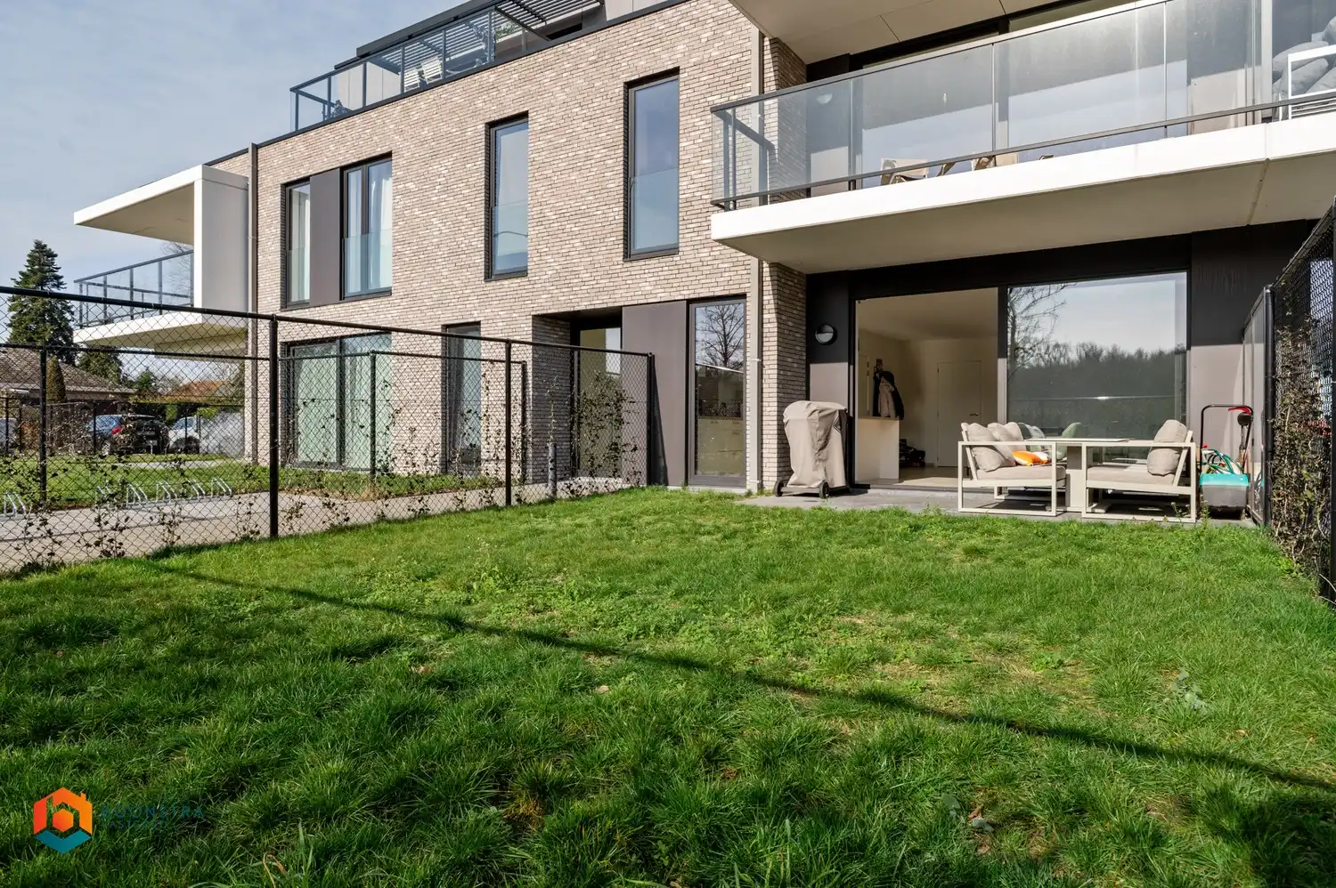 Energiezuinig gelijkvloers appartement met terras, tuintje en ondergrondse parkeerplaats foto 12