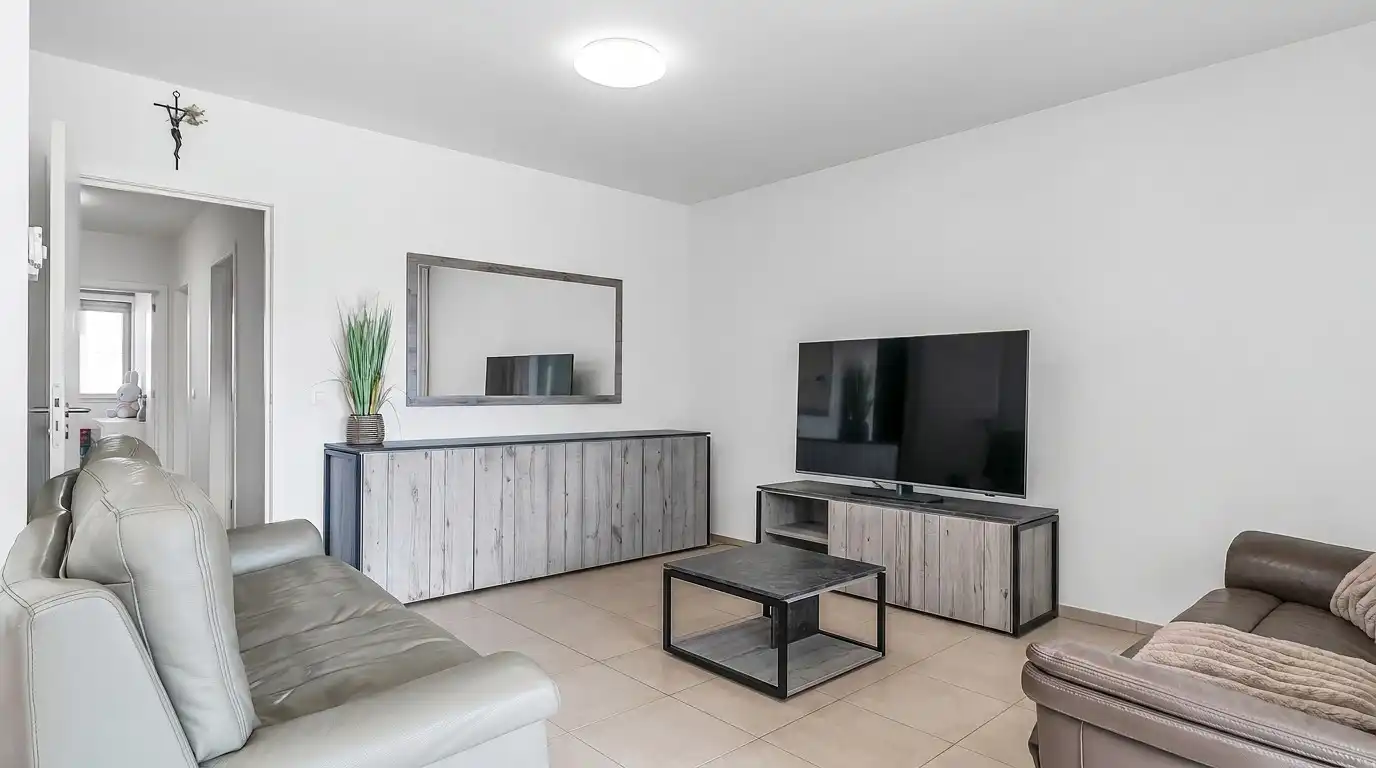 Instapklaar en energiezuinig appartement met 2 slaapkamers en 2 ondergrondse autostaanplaatsen foto 4