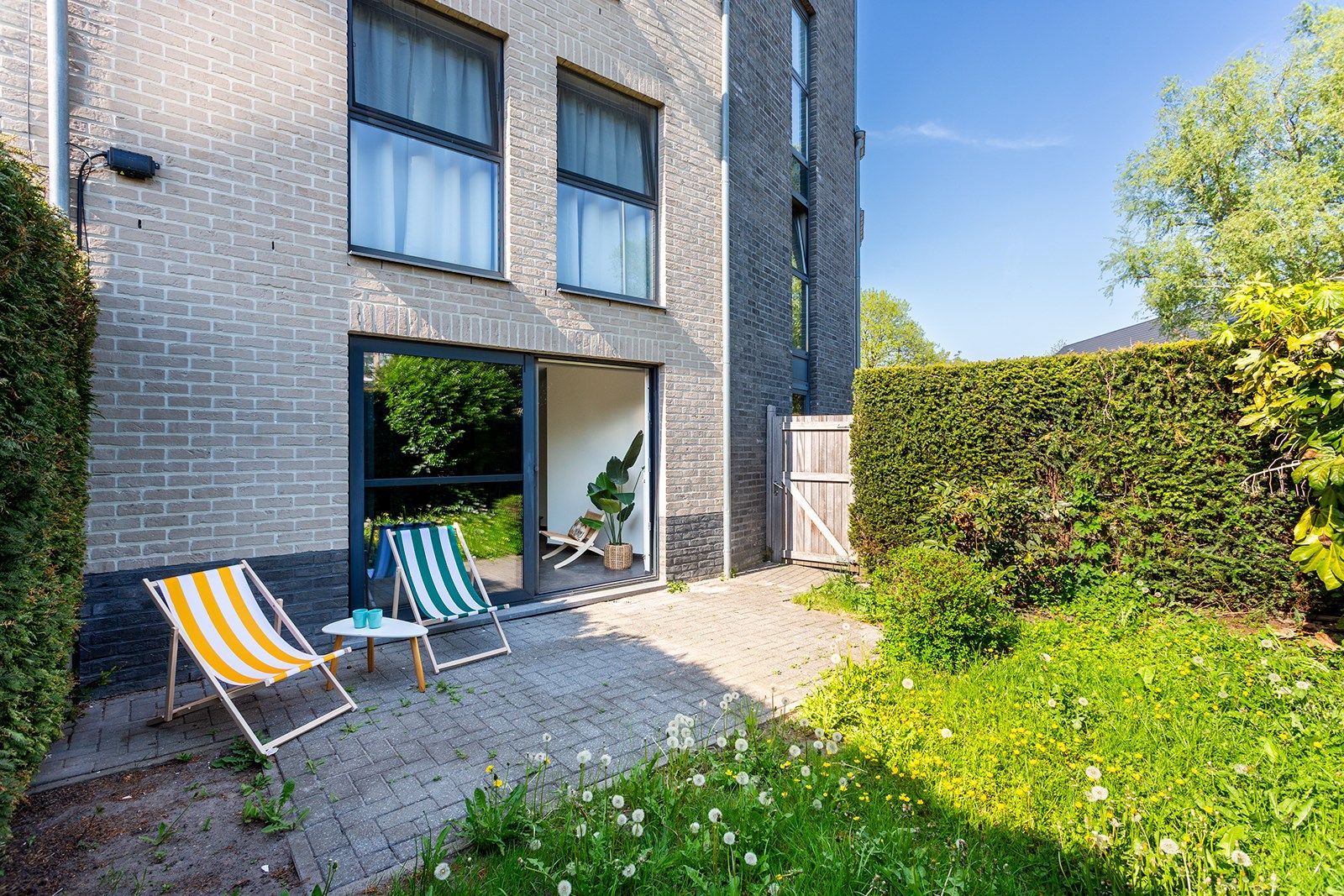 Ruim en prima gelegen appartement met tuin te Boechout foto 9