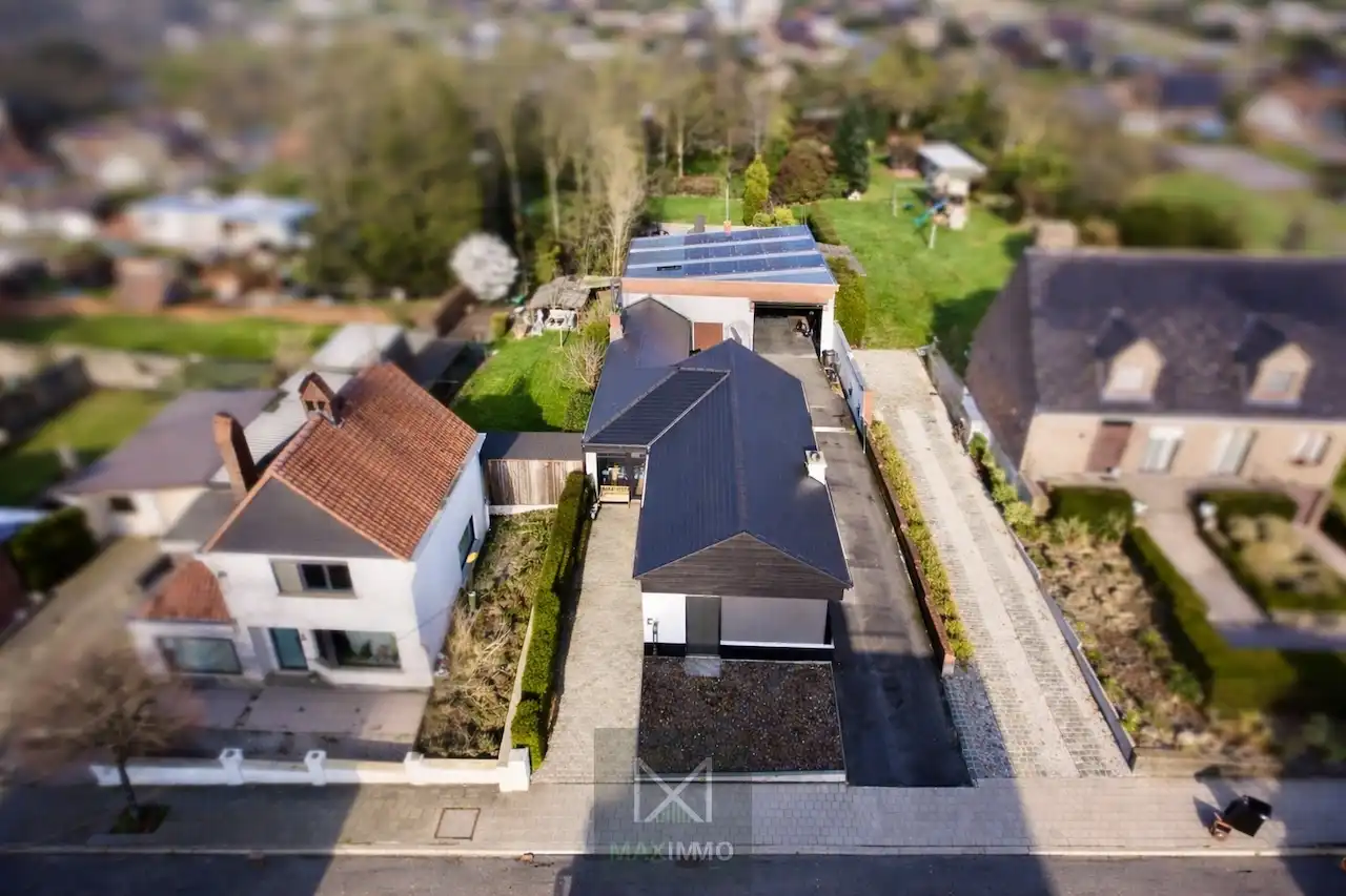 Gelijkvloerse bungalow met loods van 180 m² in het centrum van Marke foto 28