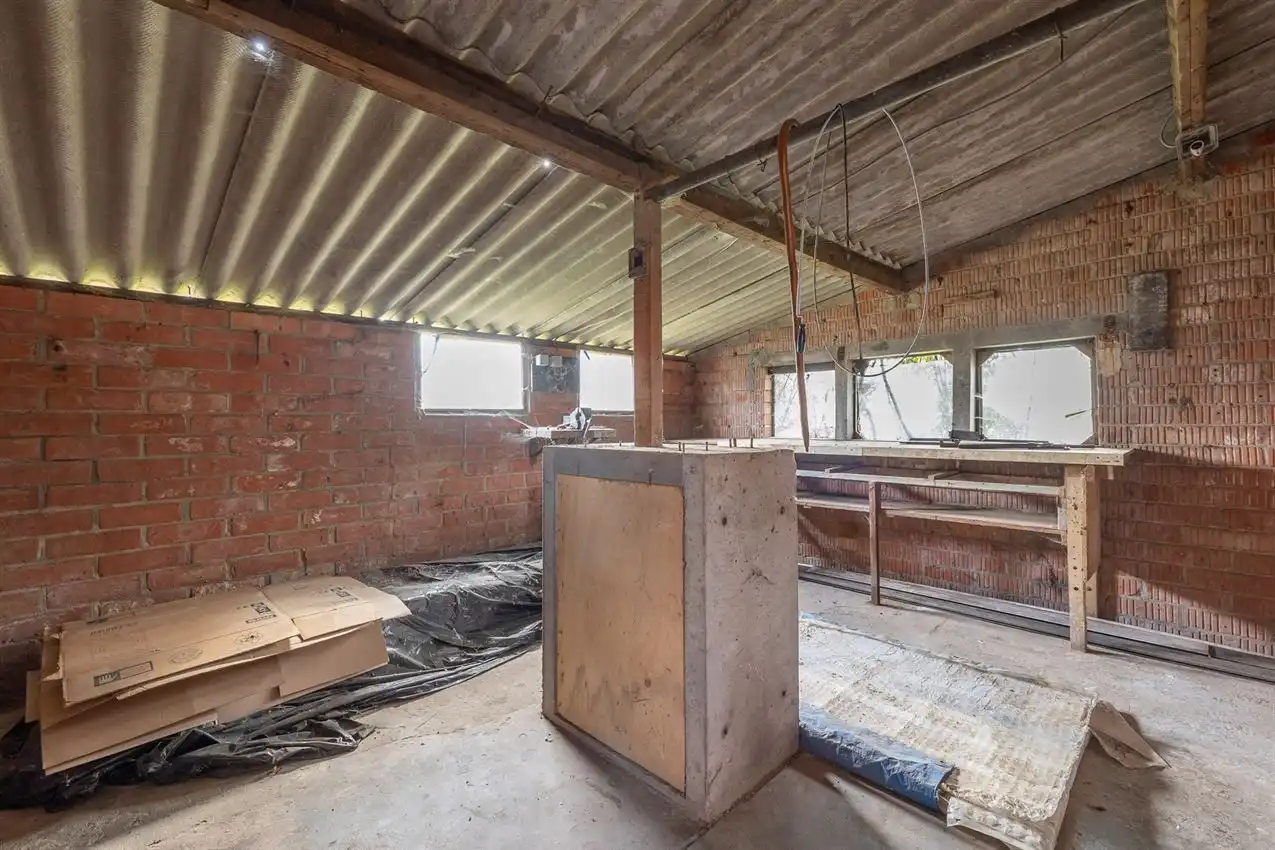 Vlakbij ingang merodebossen, soldie woning met potentieel foto 34