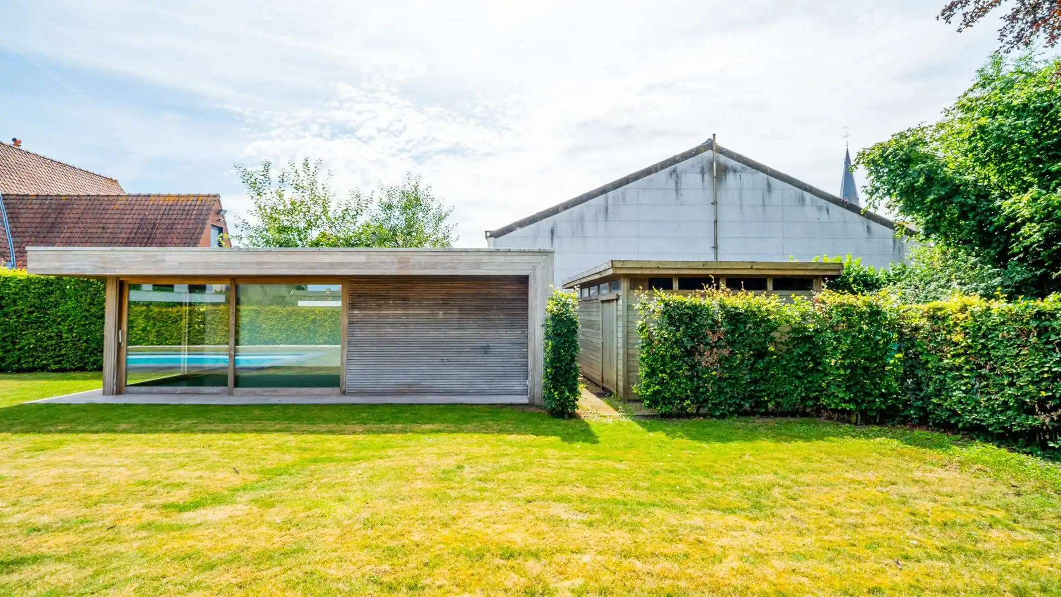 Knappe villa met zuidgerichte tuin, zwembad en poolhouse foto 35