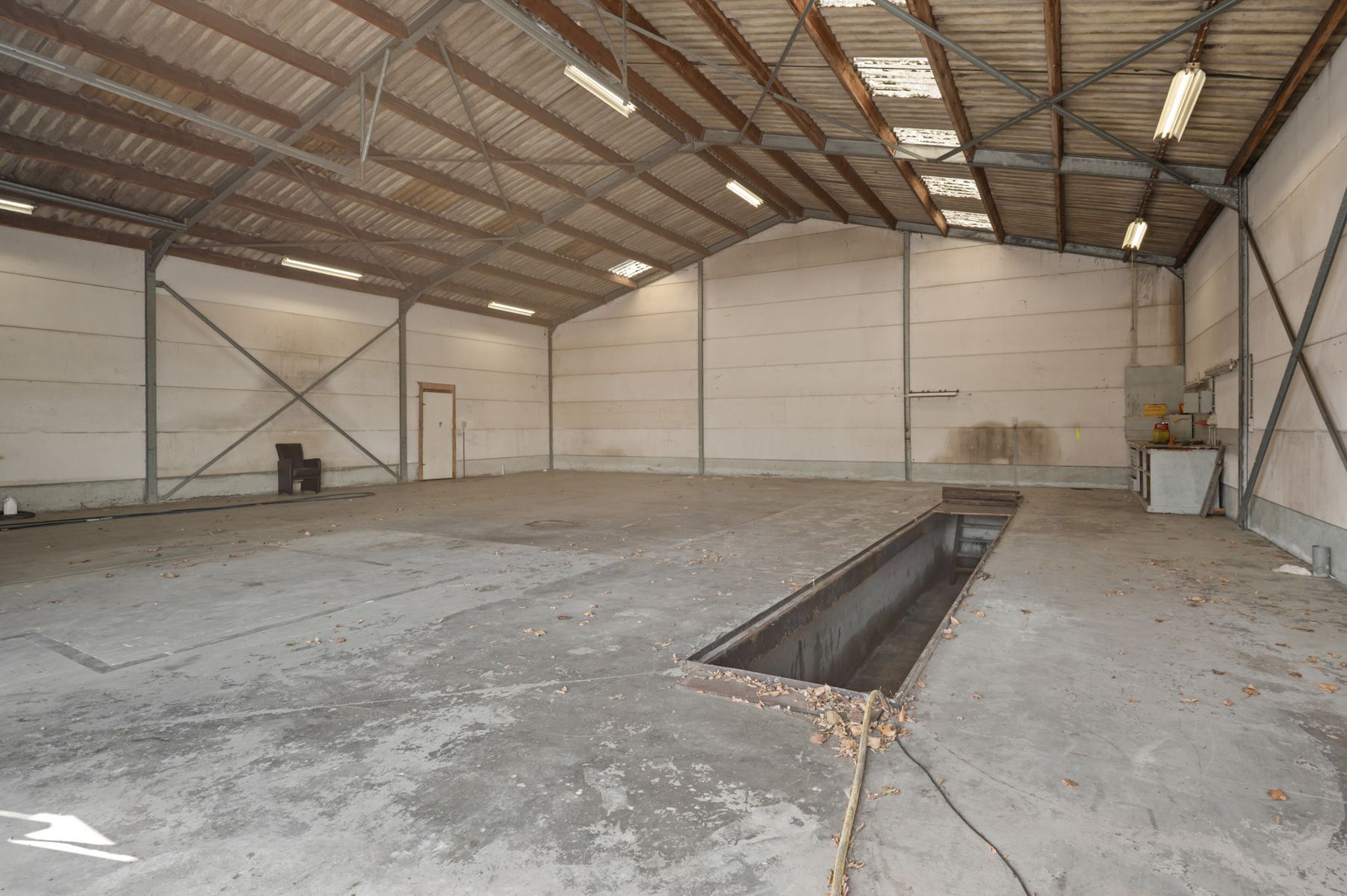 Woning met industriehal (212m2) op 2229m2 grond foto 47