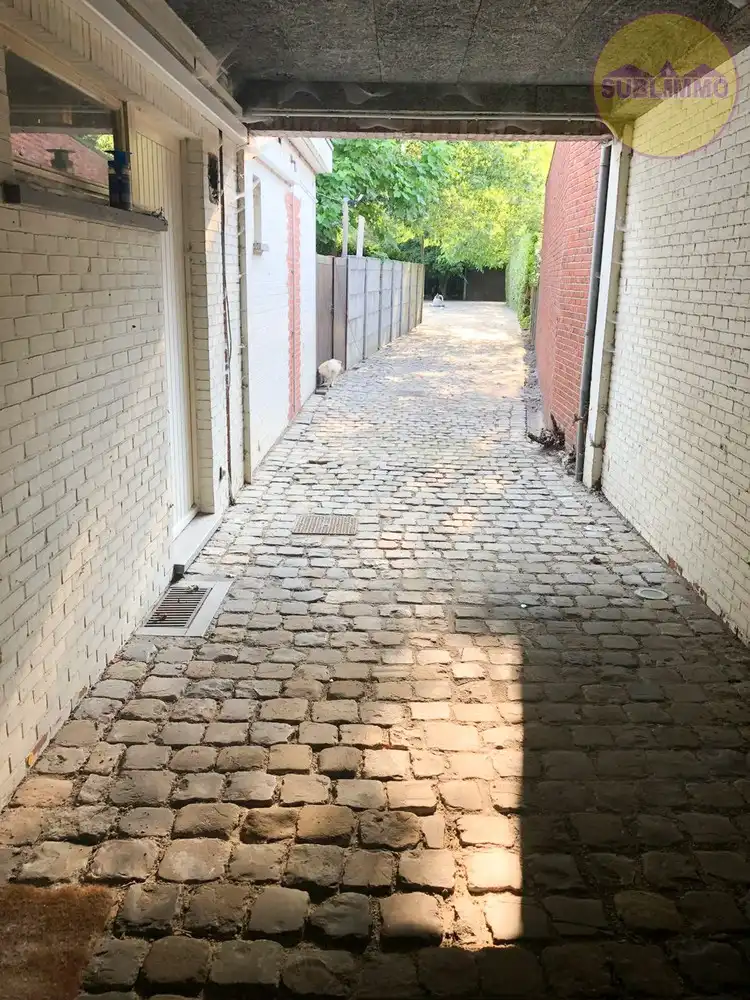 Instapklare woonst met tuin en handelspand in hartje Geel foto 23