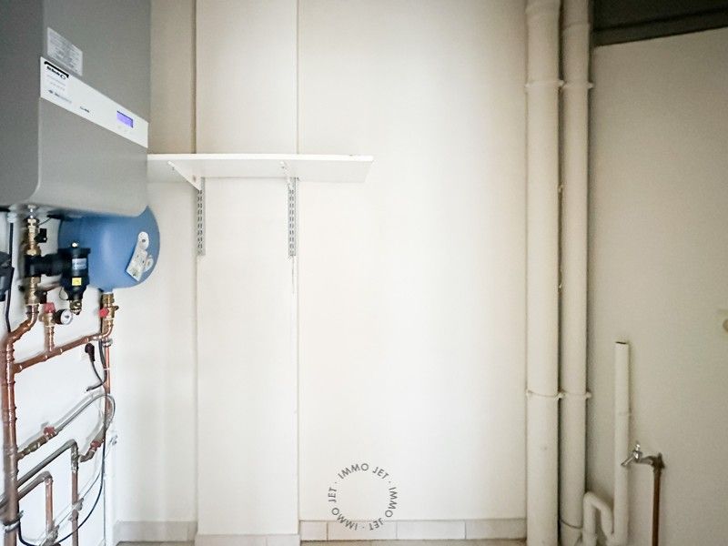 Centraal gelegen appartement met drie slaapkamers en garage foto 5