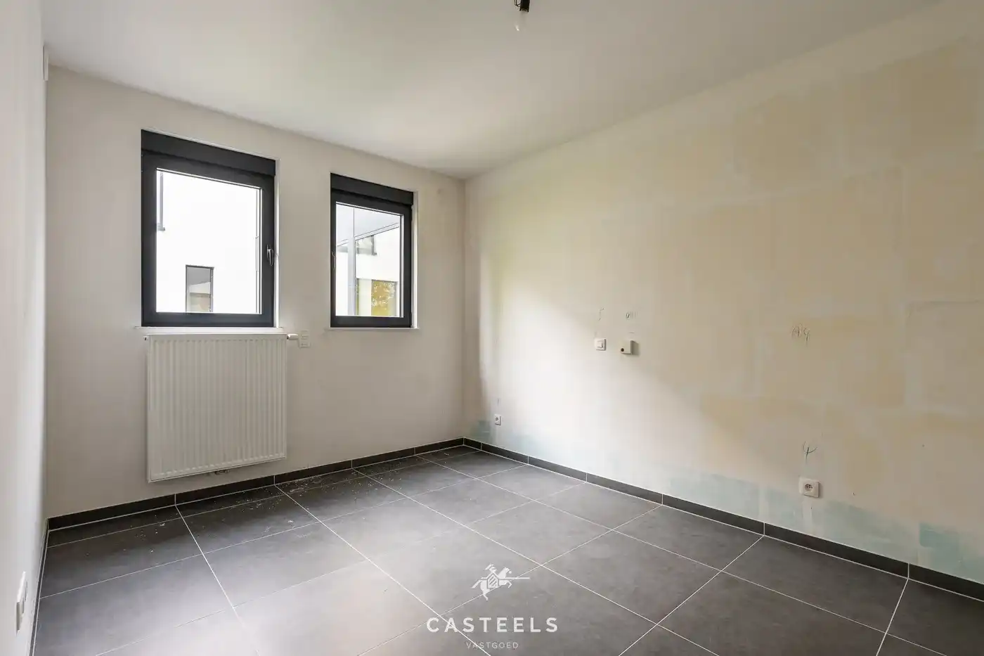 Lichtrijk appartement met grote gemeenschappelijke tuin foto 9
