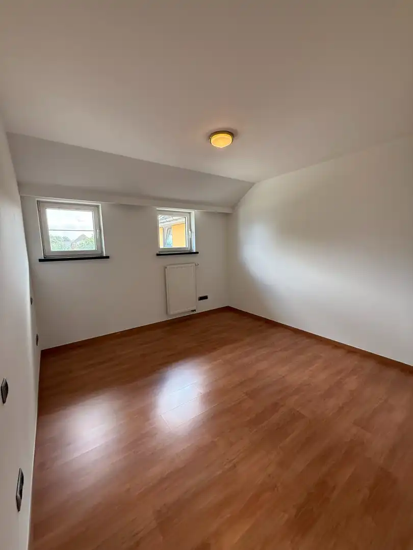 Ruim appartement met 2 slaapkamers en 2 terrassen op een vlot bereikbare locatie in Achel. foto 16