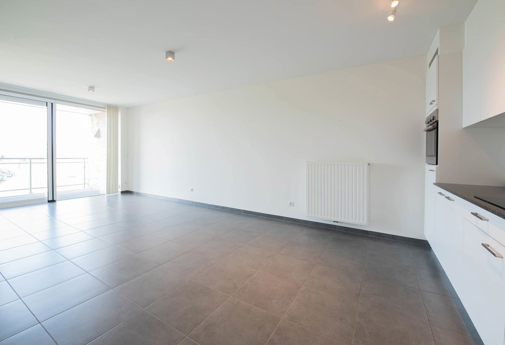 Serviceflat met autostandplaats & kelderberging foto 4