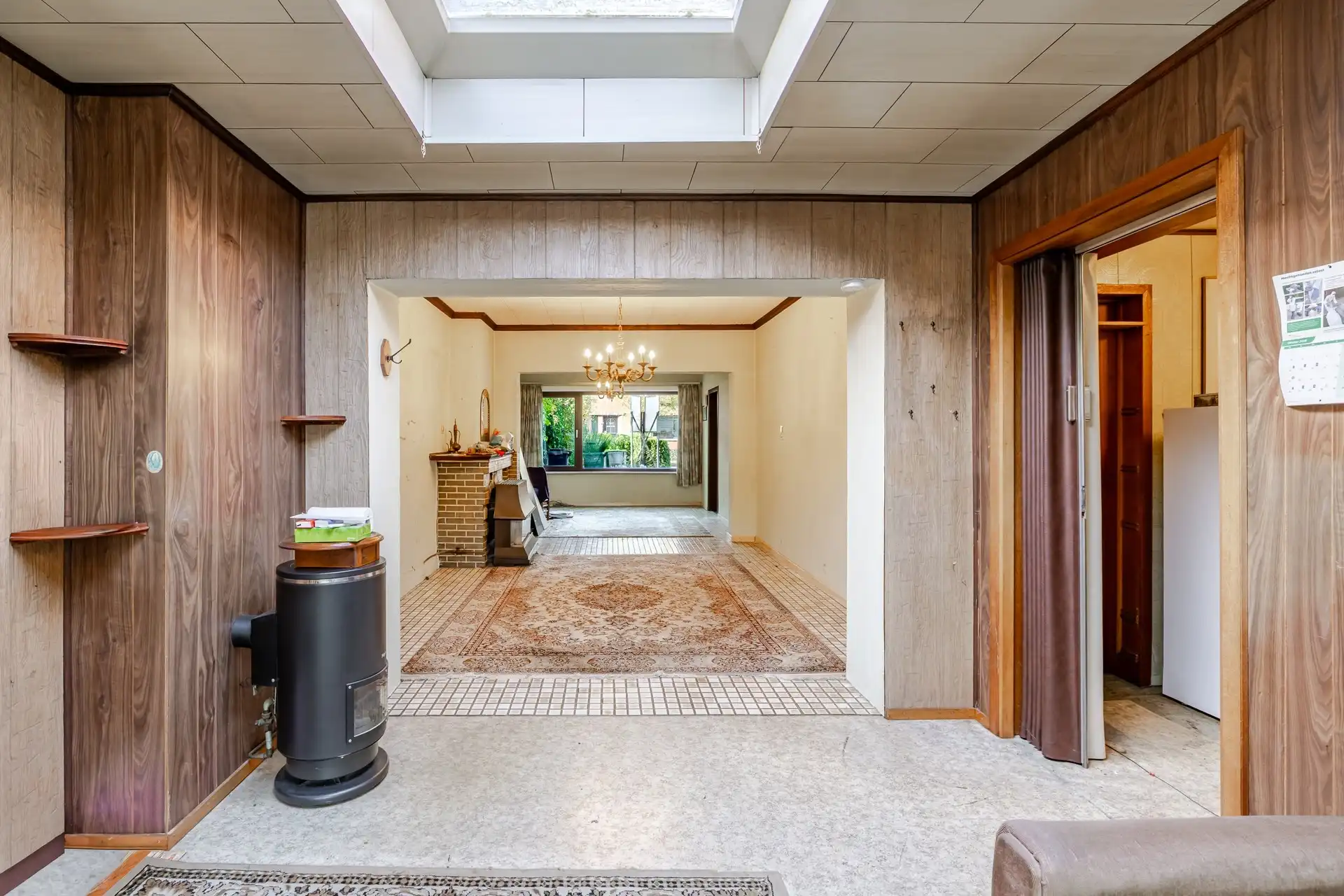 Charmante rijwoning met garage en groene tuin, klaar voor jouw stempel foto 13