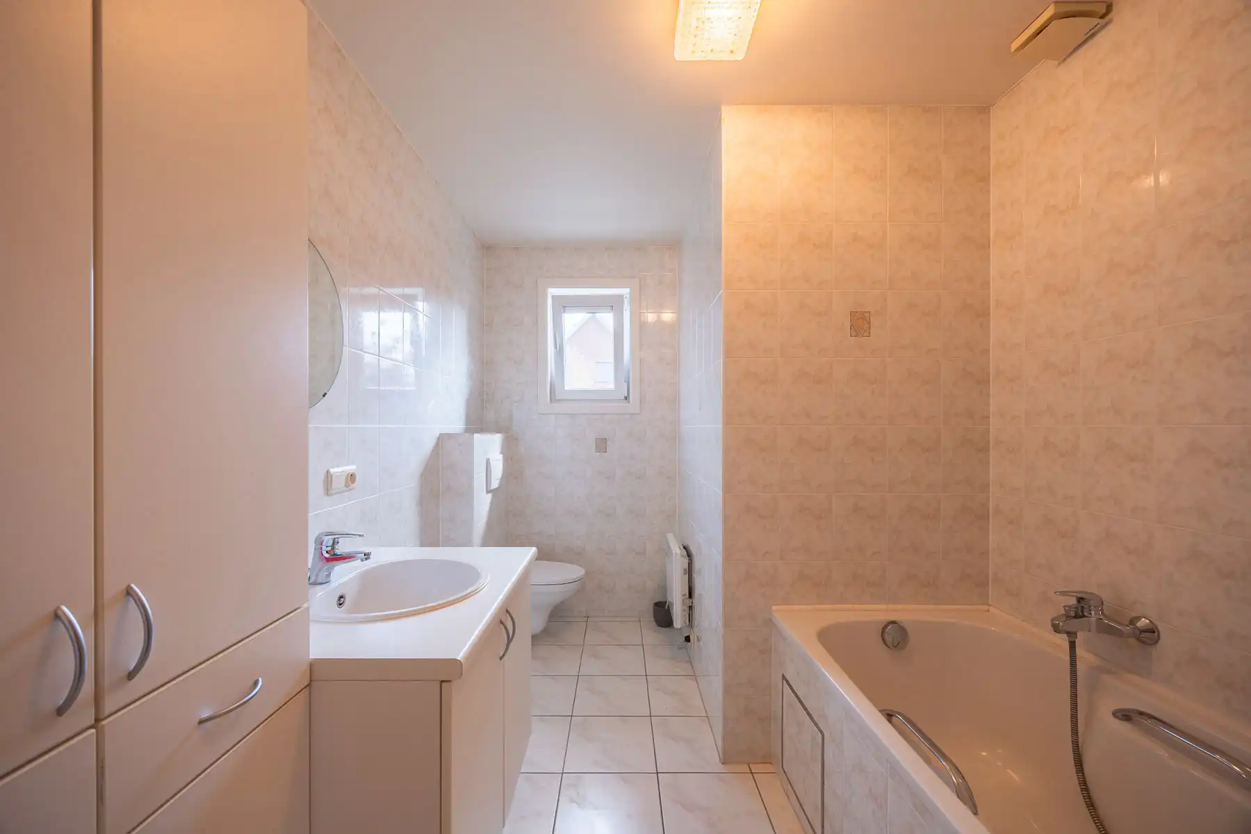 Gelijkvloerse open bebouwing met onderhoudsvriendelijke tuin foto 13