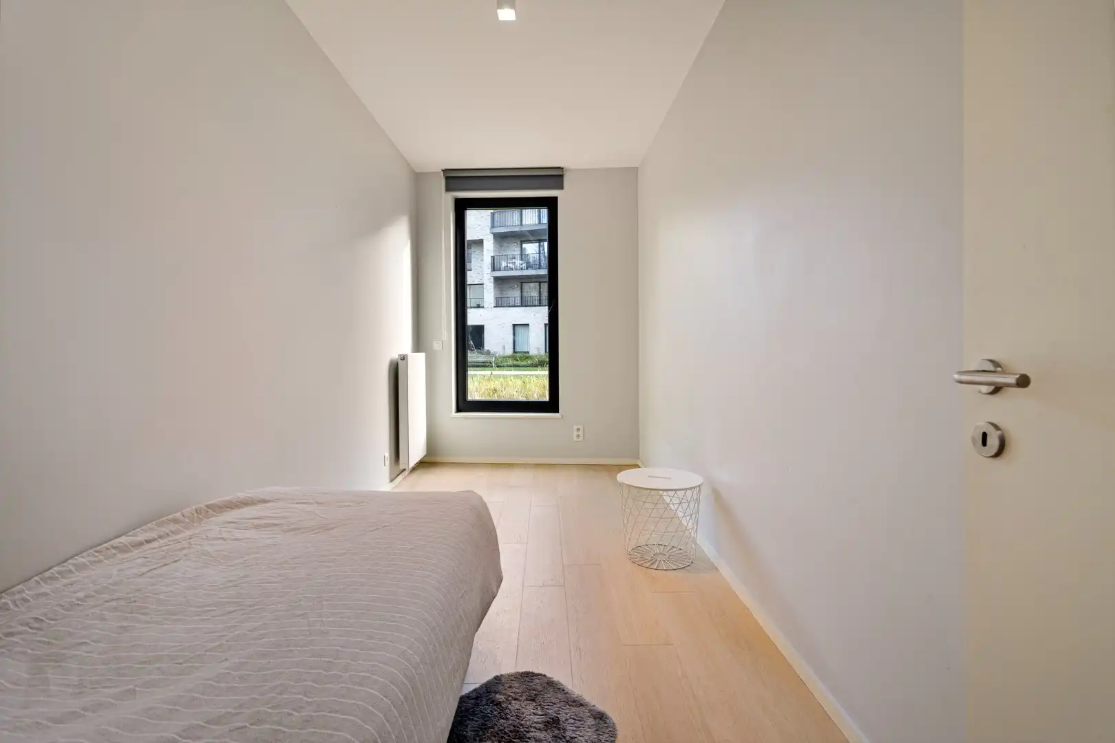 3- slaapkamer appartement gelegen te midden van het groen met privatieve tuin. foto 11