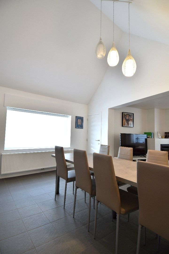 Halfopen bebouwing met 2 slaapkamers, garage en gezellig zonneterras te koop in Bellegem foto 9