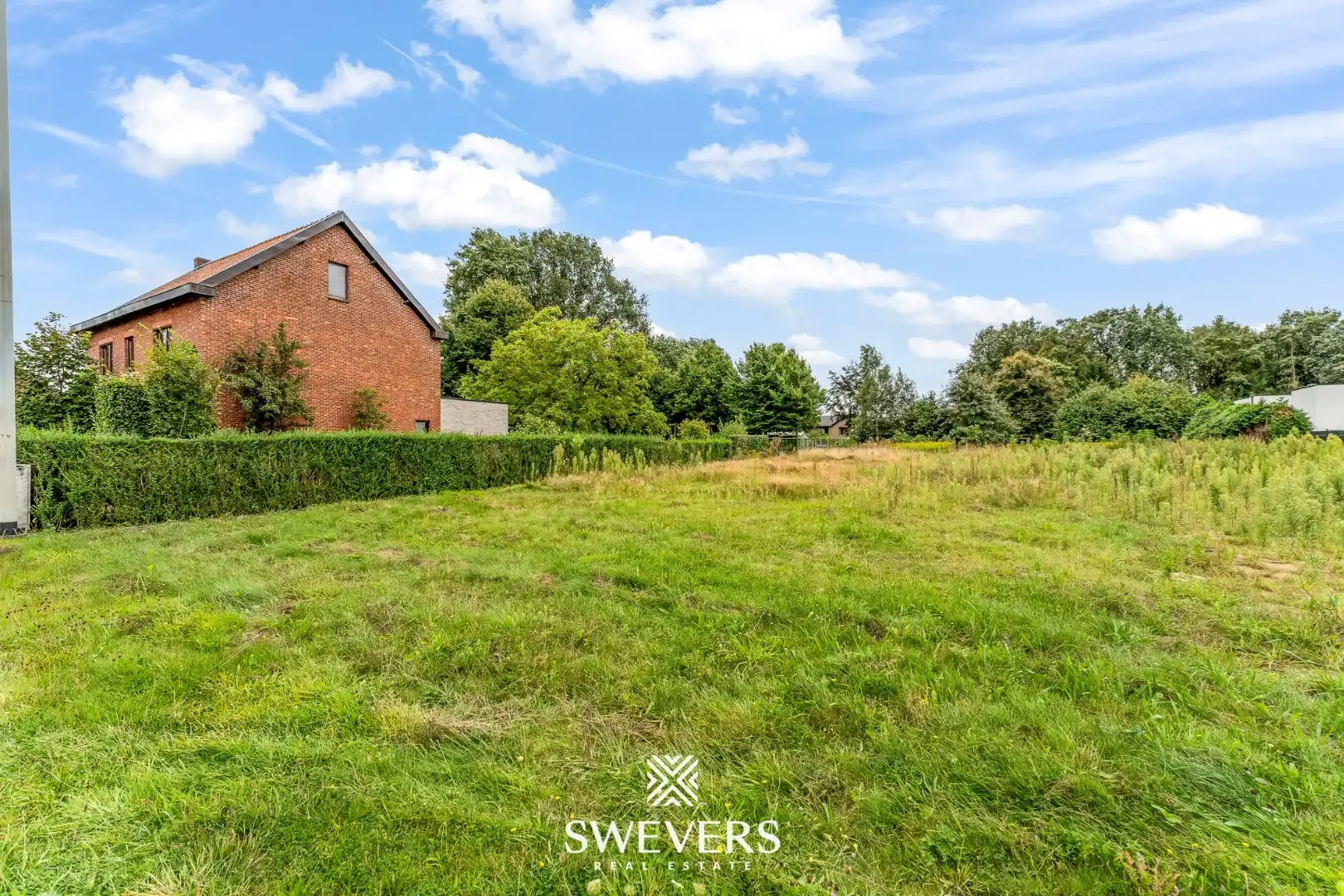 Knappe bouwgrond voor open bebouwing op 12a 74ca in hartje Helchteren foto 12