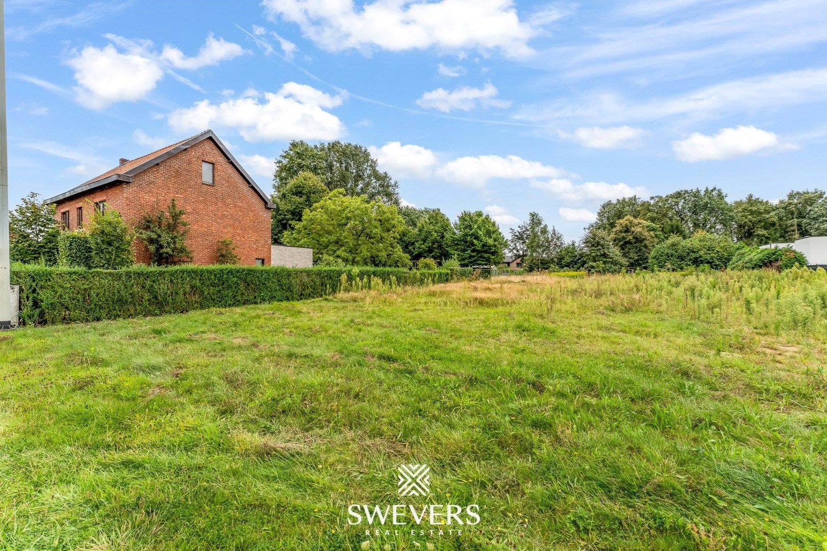 Knappe bouwgrond voor open bebouwing op 12a 74ca in hartje Helchteren foto 12