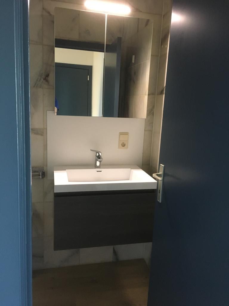 Instapklaar appartement met terras en autostandplaats in hartje Beringen foto 10