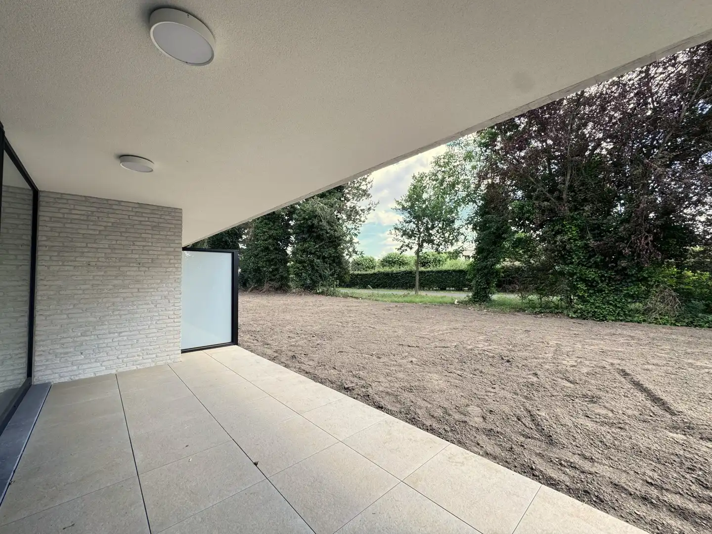 Prachtig nieuwbouwappartement met groot terras en tuin! (prijs inclusief garagebox en syndickosten) foto 12