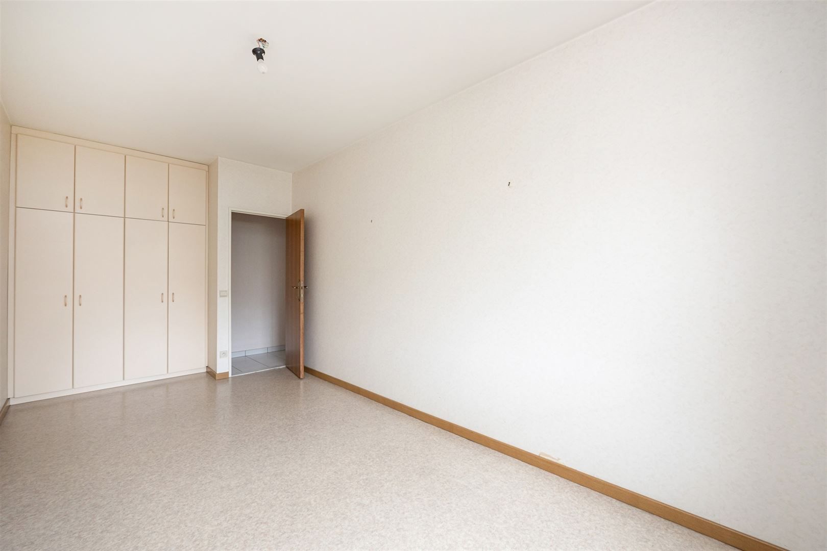 Gelijkvloers appartement met 3 slpks, garage en tuintje! foto 12