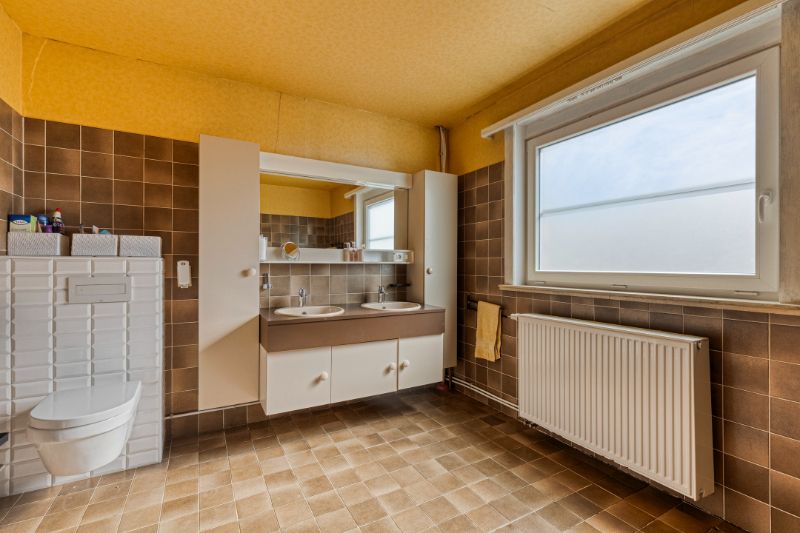 Ruime open bebouwing met potentieel in groene, rustige buurt van Evergem foto 6