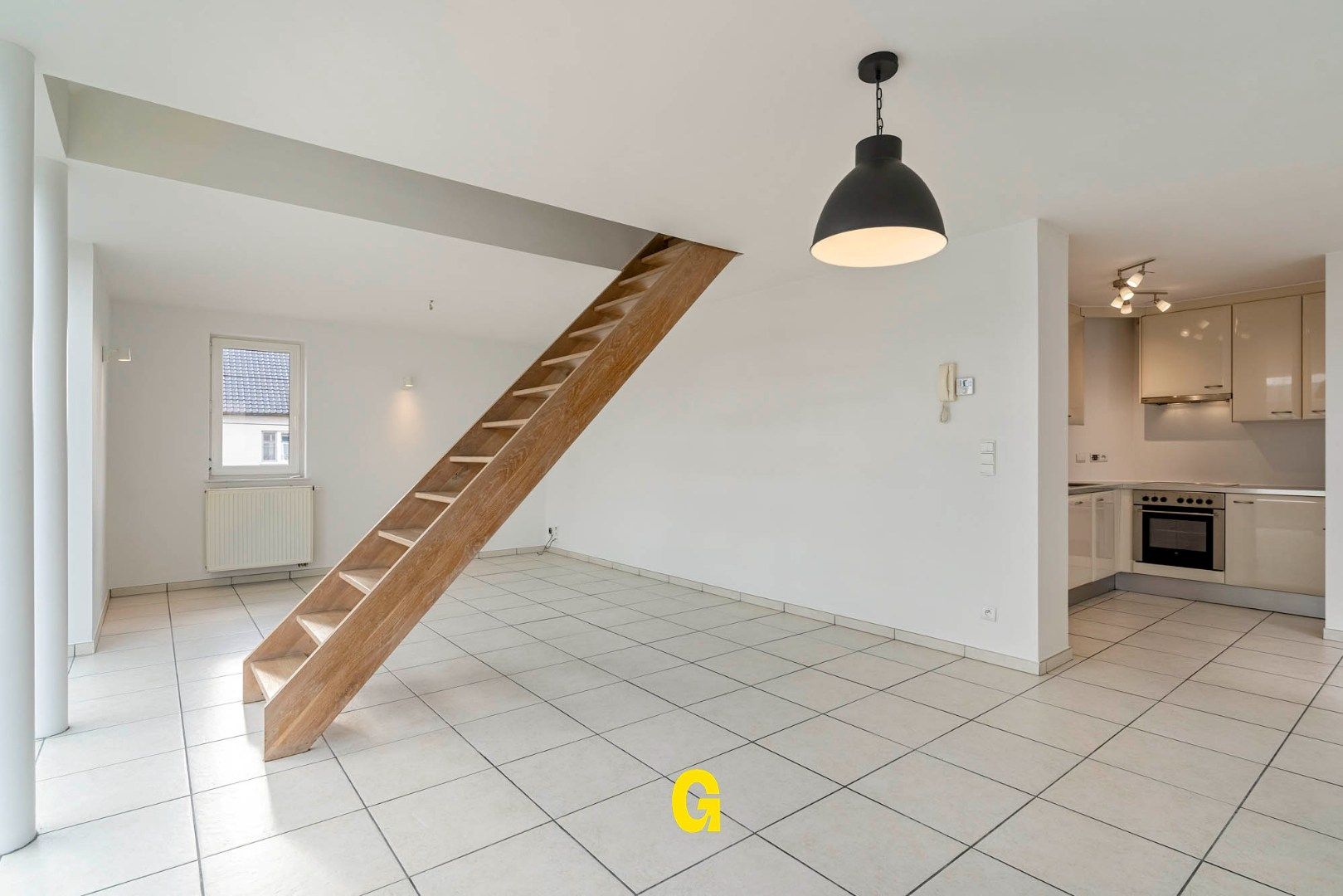 Aangenaam duplexappartement met drie slaapkamers, autostandplaats en kelderberging foto 2
