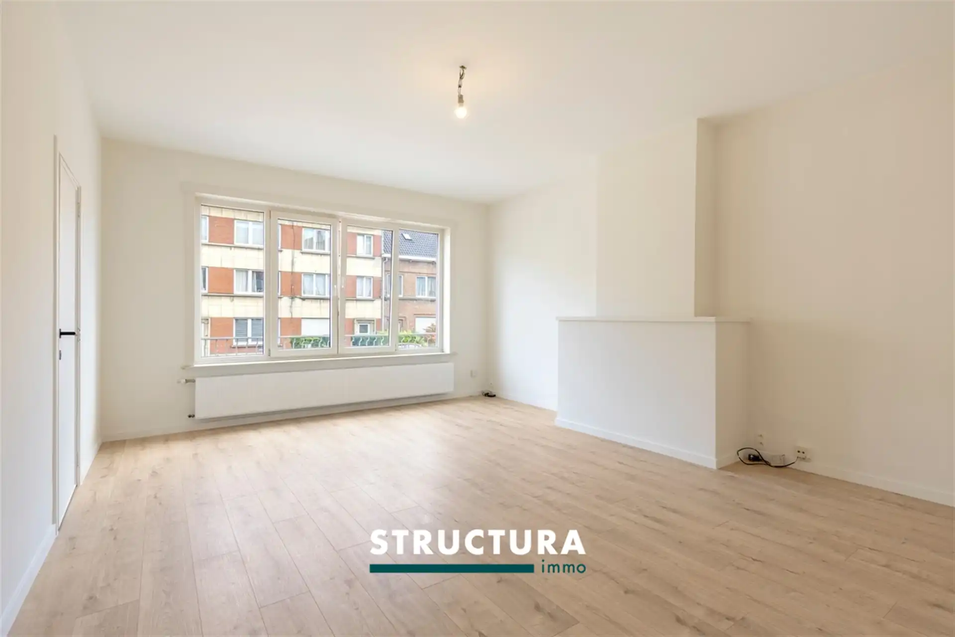 Gerenoveerd appartement met tuin op centrale ligging foto 3