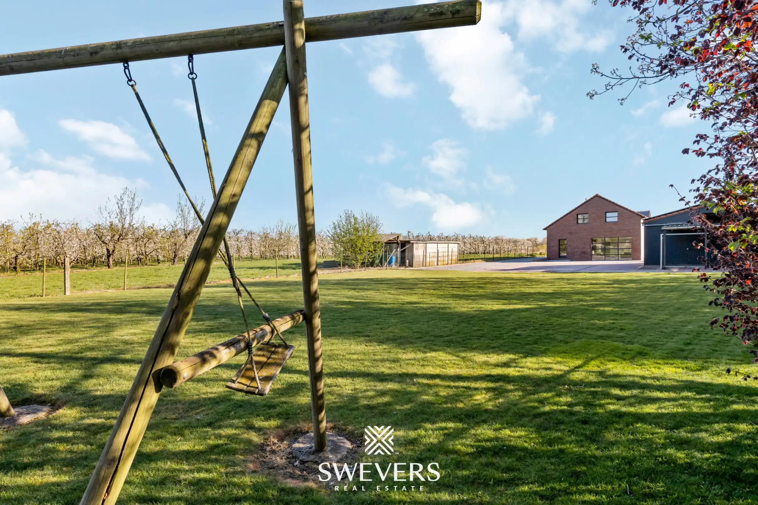 Instapklare open bebouwing met ruime tuin en prachtig uitzicht tussen de boomgaarden in Gingelom foto 28