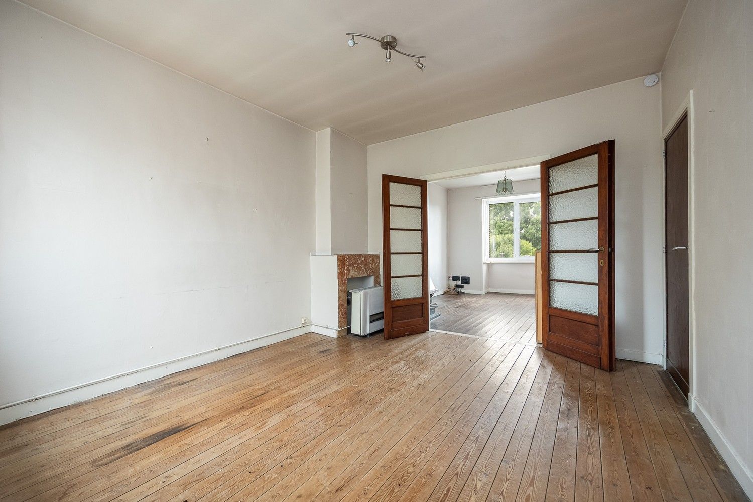Te renoveren opbrengsteigendom met 3 éénslaapkamerappartementen nabij het Boekenbergpark foto 17