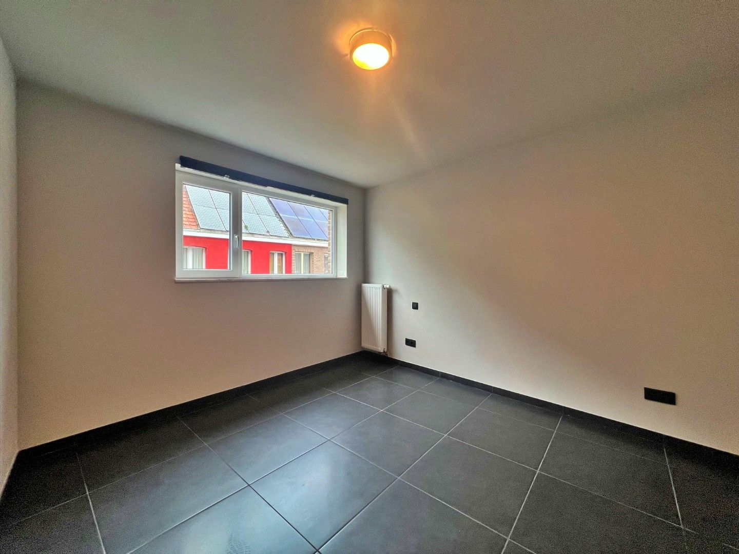 2-slaapkamer appartement met 2 overdekte staanplaatsen foto 13