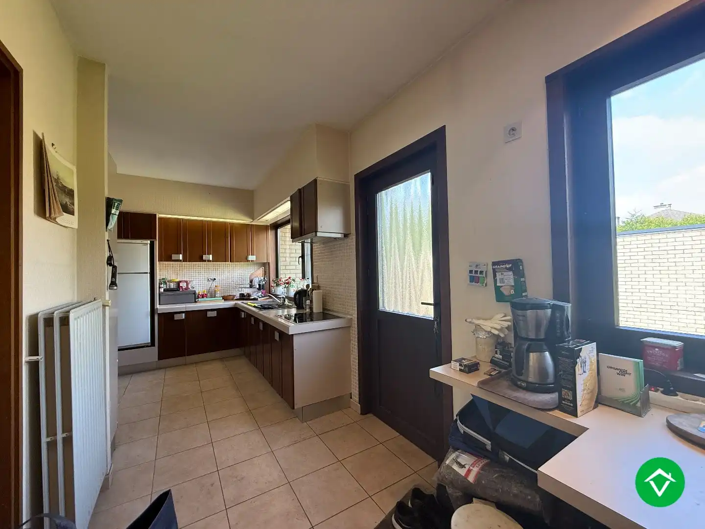 Rustig gelegen gelijkvloerse halfopen woning met 2 slpk's + dubbele garage foto 8