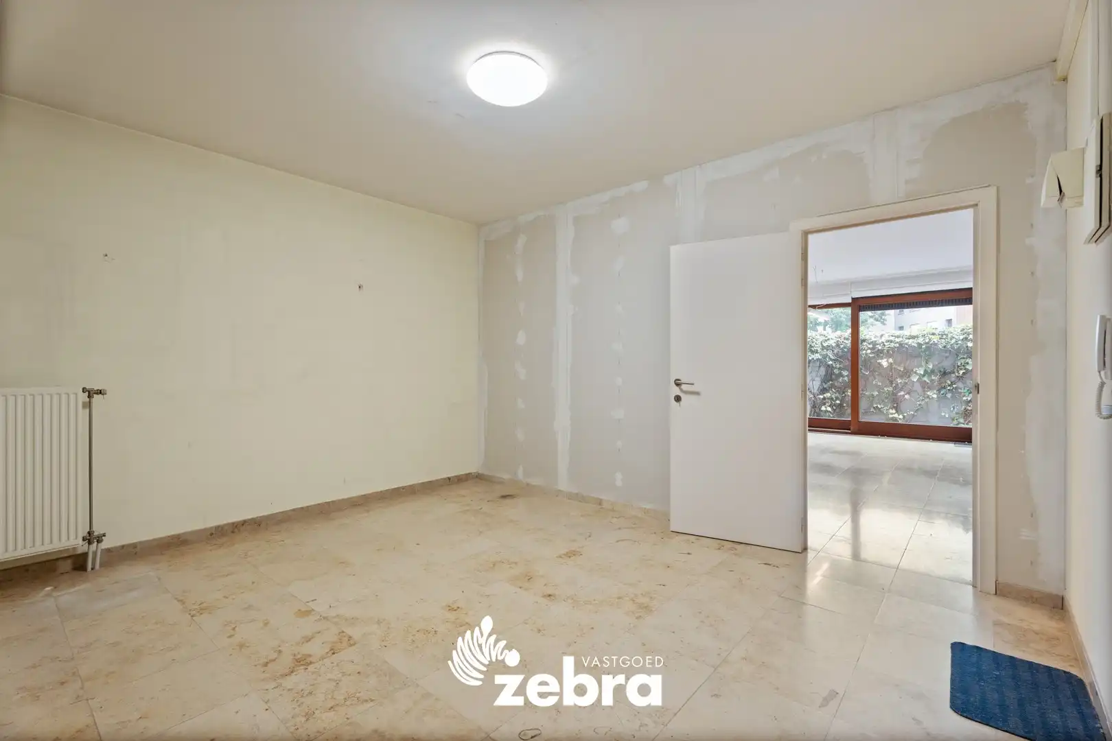 Veelzijdig handelspand op toplocatie in hartje Tielt – ook in te richten als woonst! foto 5