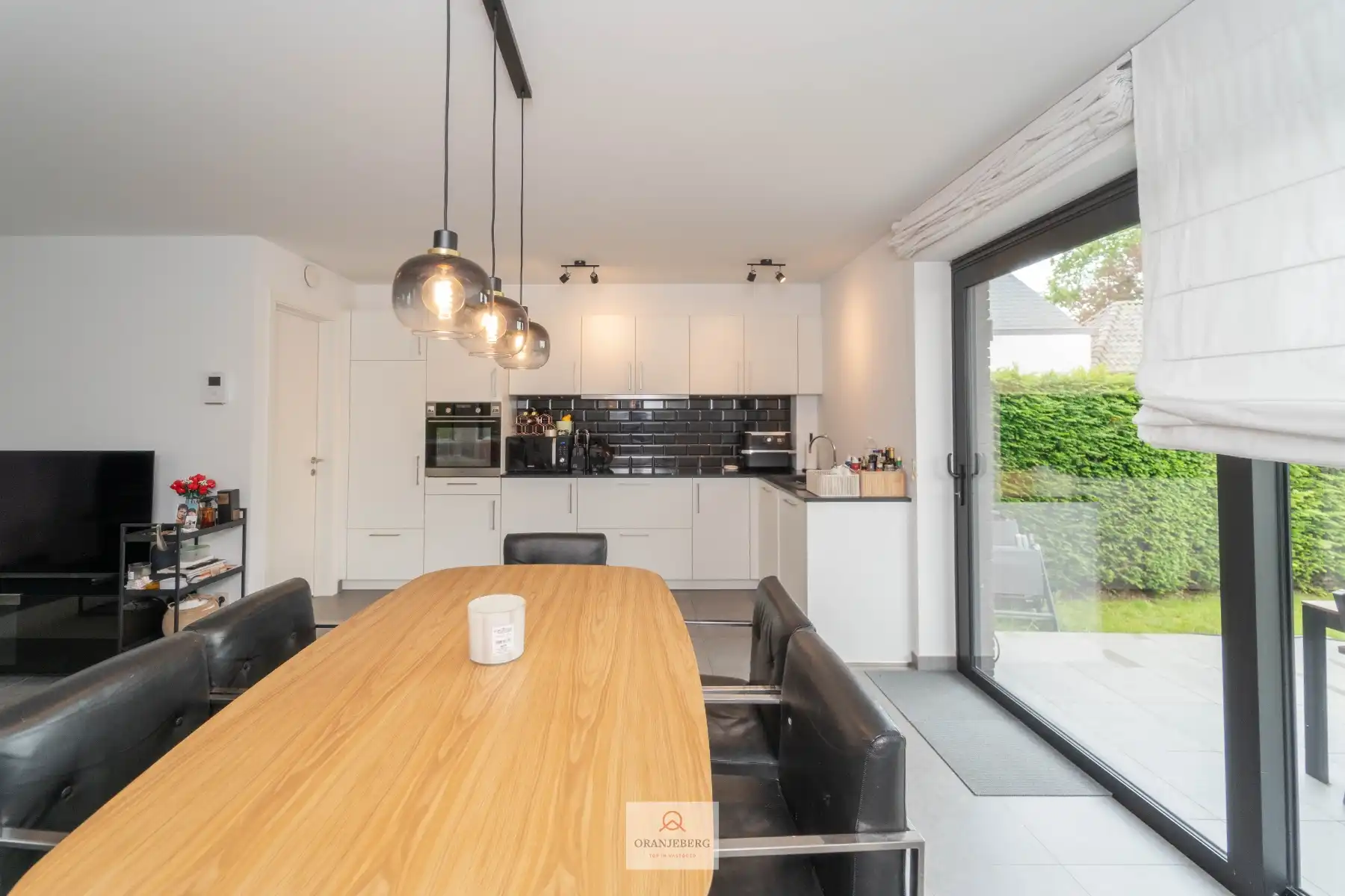 Gelijkvloers 2 slaapkamerappartement met ruime tuin foto 7