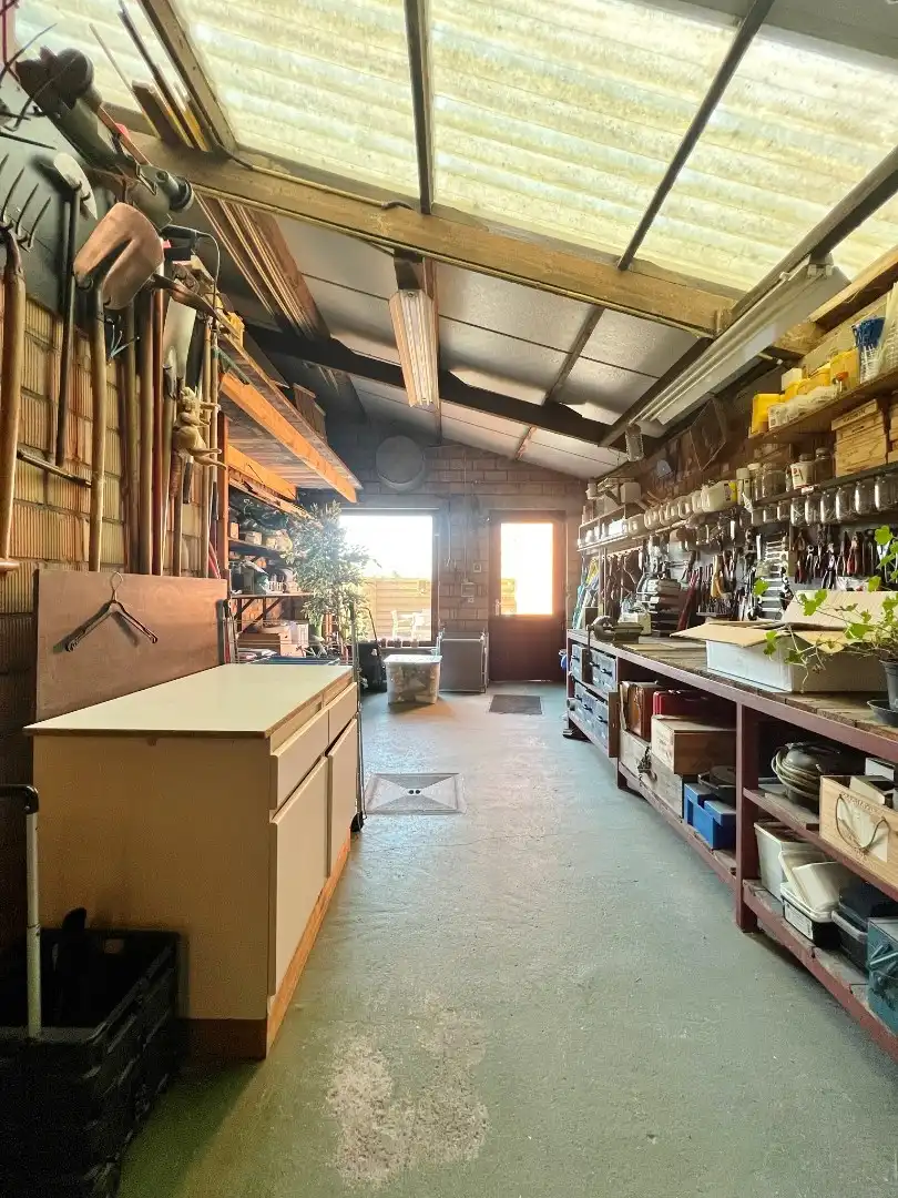 Verrassend ruime, verzorgde woning met dubbele garage en zonnige tuin.  foto 14