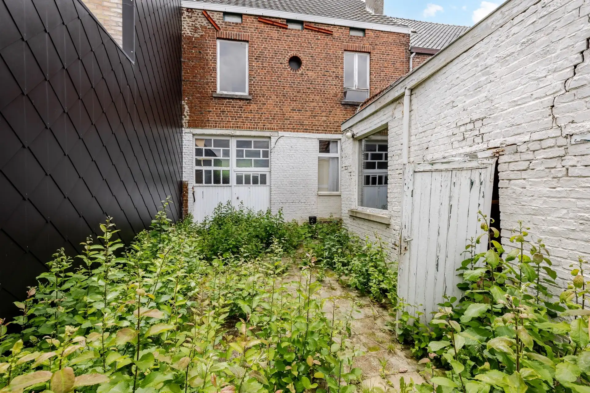 Te renoveren woning met grote tuin en garage te Haaltert foto 13