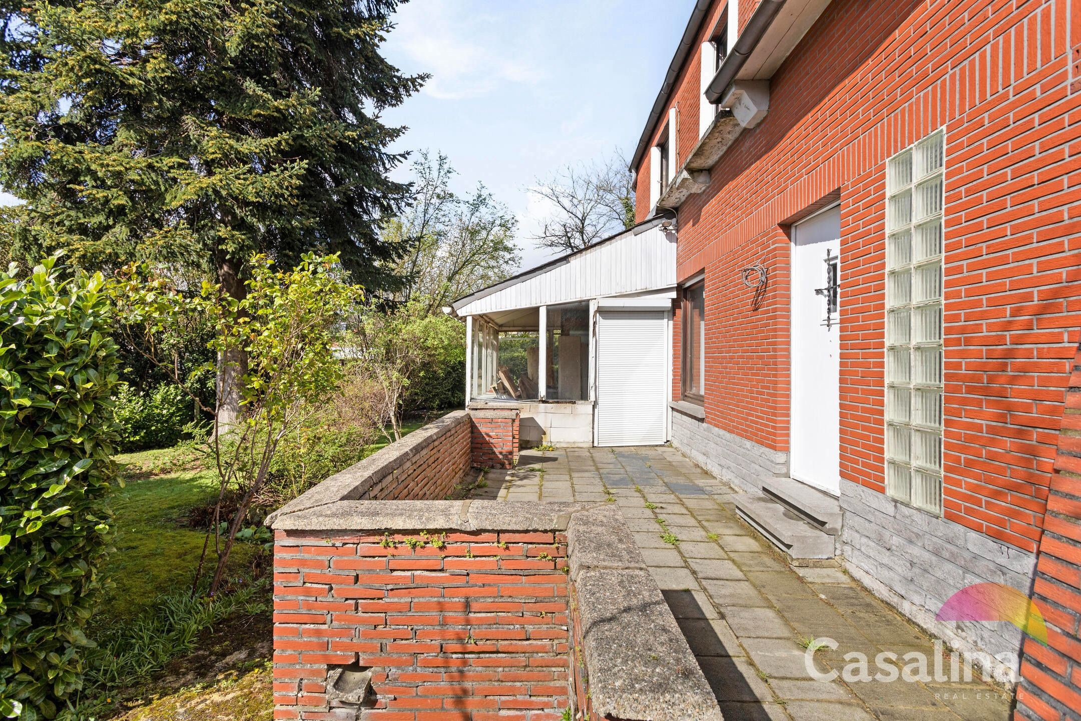 Viergevelwoning van 209m² met tuin foto 28
