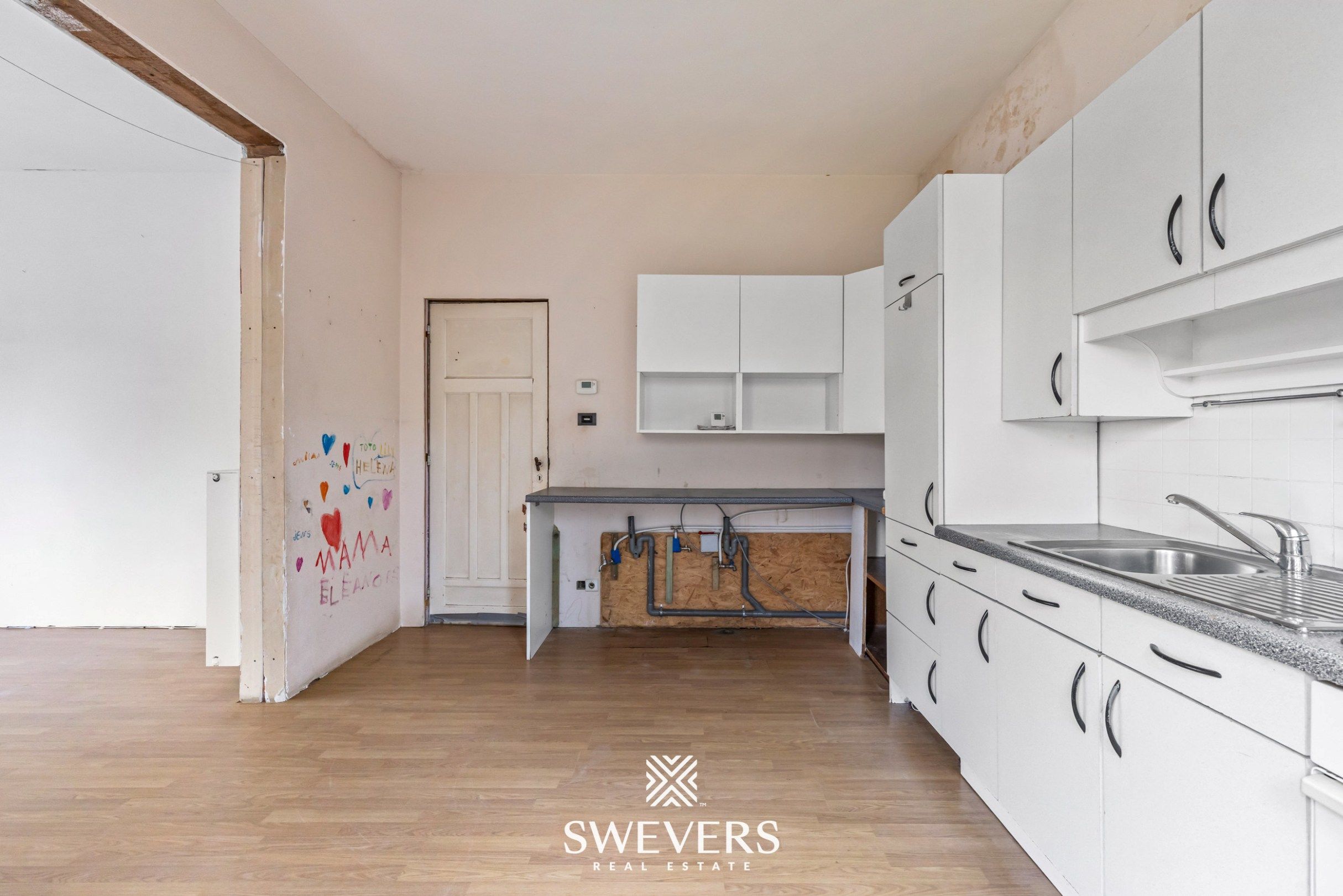 Unieke renovatiekans: karaktervol herenhuis te Zonhoven foto 8