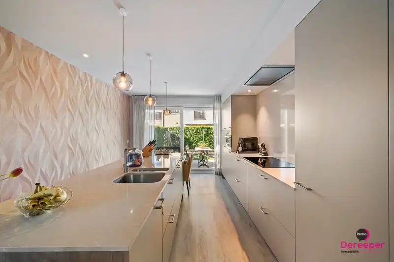 Prachtig instapklaar energiezuinig gelijkvloers appartement (2023) met tuin en 3 slaapkamers foto 3