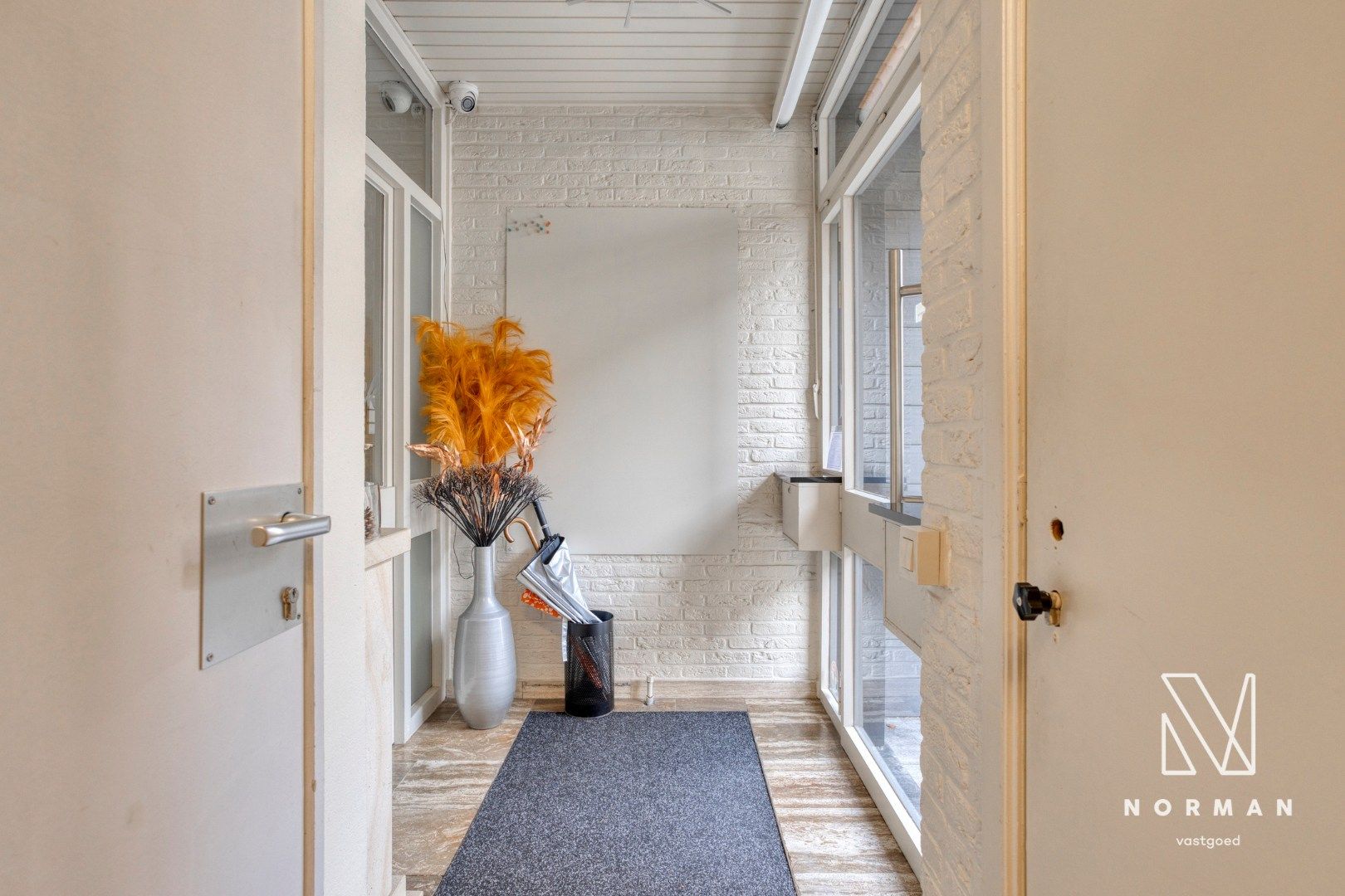 Duplex te koop in het centrum van Kuurne met 3 slaapkamers en een groot zongericht terras met tuinhuis.  foto 25