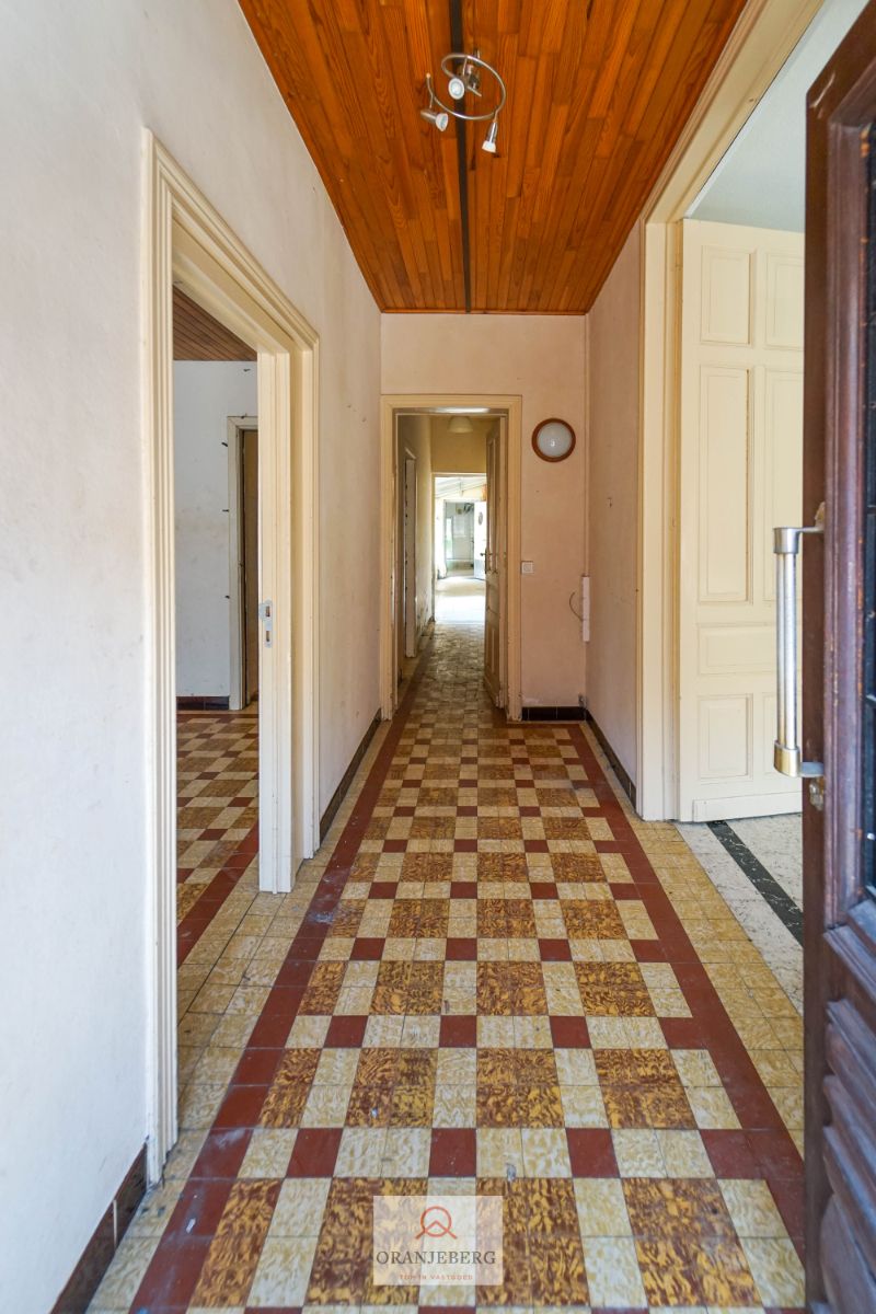 Ideaal te renoveren rijwoning + werkplaats + garage + tuin voor 591m² foto 4