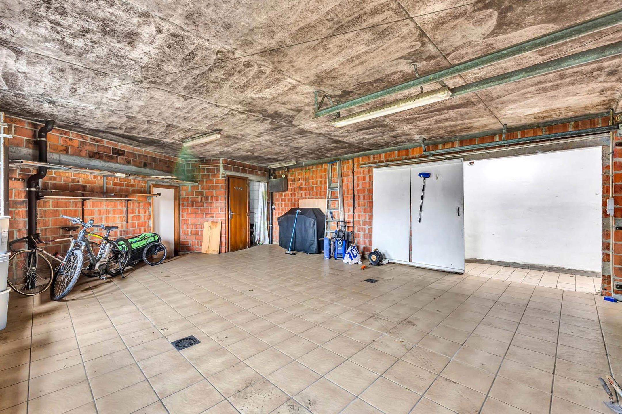 Ruime woonst met dubbele garage en veel mogelijkheden foto 10