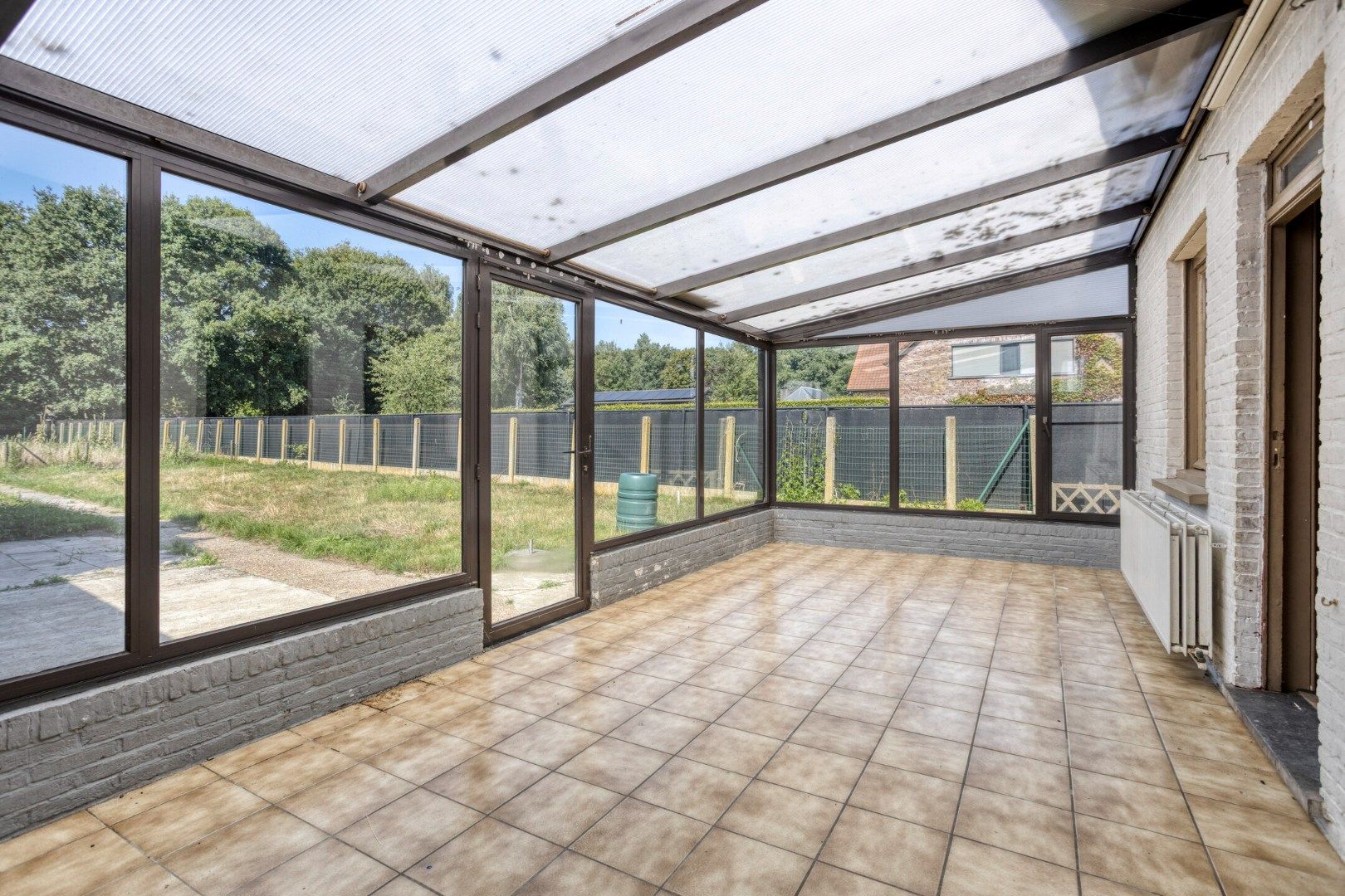 Te renoveren woning, rustig en landelijk gelegen op 1.265 m² nabij het centrum ! foto 13